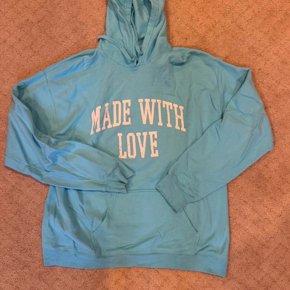 Lively Blue Hoodie with White Text